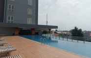 Swimming Pool 5 Cozy and Brand New Studio at Tamansari Bintaro Mansion Apartment By Travelio