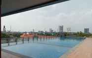 Swimming Pool 4 Cozy and Brand New Studio at Tamansari Bintaro Mansion Apartment By Travelio