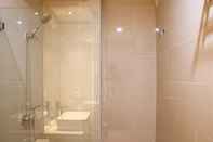 In-room Bathroom 1BR Brand New with Working Room at Daan Mogot City Apartment By Travelio