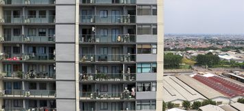 Exterior 6 Stay Cozy Studio at 27th Floor Daan Mogot City Apartment By Travelio