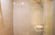 In-room Bathroom 3 Stay Cozy Studio at 27th Floor Daan Mogot City Apartment By Travelio