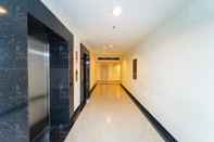 Lobby RedLiving Apartemen Grand Kamala Lagoon - Aoklah Property Tower Barclay North