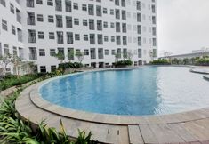 Swimming Pool 5 Best Deal and Minimalist Studio at Serpong Garden Apartment By Travelio