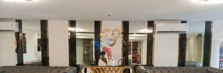 Lobby Look Simply Studio at 21st Floor De Prima Apartment By Travelio