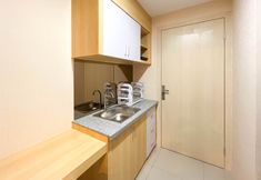 Common Space 2 Studio Comfy Room at De Prima Apartment Medan By Travelio