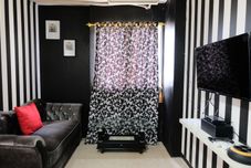 Common Space 2BR Good Deal at 16th Floor Suites @Metro Apartment By Travelio