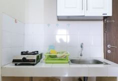 Common Space 4 2BR Good Deal at 16th Floor Suites @Metro Apartment By Travelio
