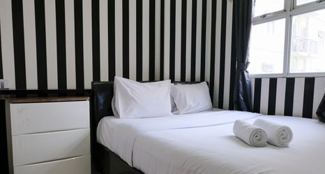 Bedroom 2 2BR Good Deal at 16th Floor Suites @Metro Apartment By Travelio