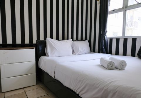 Bedroom 2BR Good Deal at 16th Floor Suites @Metro Apartment By Travelio
