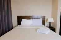 Bedroom Spacious and Homey 3BR Apartment at Braga City Walk By Travelio