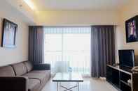 Common Space Spacious and Homey 3BR Apartment at Braga City Walk By Travelio
