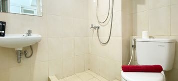 In-room Bathroom 3 Simply and Restful Studio Springlake Summarecon Bekasi Apartment By Travelio