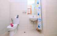 In-room Bathroom 3 Comfy and Best Strategic Studio Apartment at Woodland Park Residence By Travelio