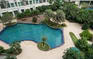 Kolam Renang 5 Comfy and Best Strategic Studio Apartment at Woodland Park Residence By Travelio