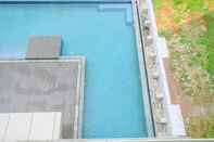 Swimming Pool Comfy and Modern Look 2BR at Vasaka Solterra Apartment By Travelio