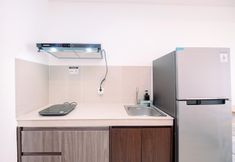 Common Space 4 Comfy and Modern Look 2BR at Vasaka Solterra Apartment By Travelio