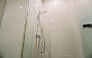 In-room Bathroom 5 Modern Look and Comfort 2BR Apartment M-Town Signature By Travelio