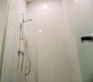 In-room Bathroom 5 Modern Look and Comfort 2BR Apartment M-Town Signature By Travelio