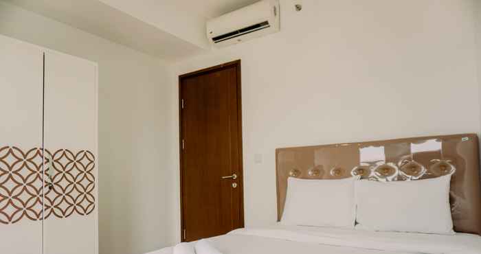 Bedroom Modern Look and Comfort 2BR Apartment M-Town Signature By Travelio