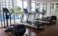 Fitness Center 7 Modern Look and Comfort 2BR Apartment M-Town Signature By Travelio