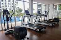 Fitness Center Modern Look and Comfort 2BR Apartment M-Town Signature By Travelio