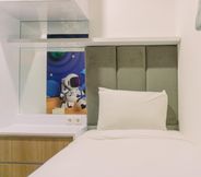 Bedroom 3 Modern Look and Comfort 3BR Sky House BSD Apartment By Travelio