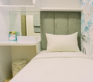 Bedroom 2 Modern Look and Comfort 3BR Sky House BSD Apartment By Travelio