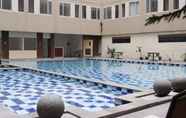 Swimming Pool 5 Studio Best Deal at Emerald Towers Apartment By Travelio