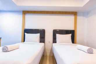 Bedroom Stay Cozy Studio at De Prima Apartment By Travelio