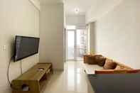 Ruang Umum Comfy and Modern Look 2BR Vasanta Innopark Apartment By Travelio