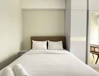 Bedroom 2 Comfy and Modern Look 2BR Vasanta Innopark Apartment By Travelio