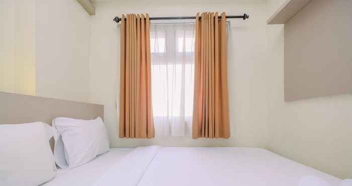 Bedroom 2BR Comfort Designed at Green Pramuka City Apartment By Travelio