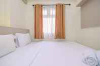 Bedroom 2BR Comfort Designed at Green Pramuka City Apartment By Travelio