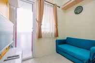 Ruang Umum 2BR Comfort Designed at Green Pramuka City Apartment By Travelio