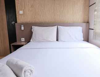 Kamar Tidur 2 1BR Homey Apartment at The Edge Bandung By Travelio