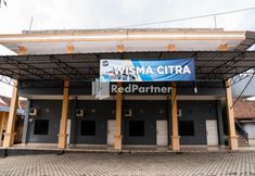 Exterior 5 Wisma Citra Metro Mitra RedDoorz