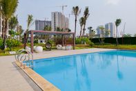 Swimming Pool Homey and Simple Studio Apartment at Sky House BSD By Travelio