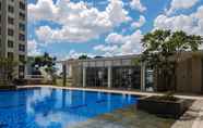 Swimming Pool 4 Simply and Homey 1BR M-Town Signature Apartment By Travelio