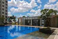 Swimming Pool Simply and Homey 1BR M-Town Signature Apartment By Travelio
