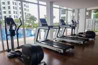 Fitness Center Simply and Homey 1BR M-Town Signature Apartment By Travelio