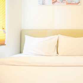 Bedroom 1 อพาร์ตเมนต์ Osaka Riverview 2BR ที่อบอุ่นและดีลดี ไม่มีห้องนั่งเล่น โดย Travelio, โรงแรม & ที่พัก CSCODS Nice Project PIK 2