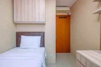 Kamar Tidur 4 Comfort and Nice 2BR Apartment at Woodland Park Residence By Travelio