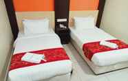 Kamar Tidur 4 The Starion Hotel