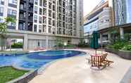 Swimming Pool 5 Simply Look and Best Deal Studio Transpark Cibubur Apartment By Travelio