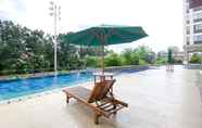 Swimming Pool 4 Simply Look and Best Deal Studio Transpark Cibubur Apartment By Travelio