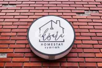 Bangunan 4 Aksara Homestay Syariah Mitra RedDoorz