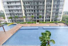 游泳池 7 Comfort 1BR Apartment with Working Room at Daan Mogot City By Travelio