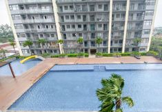 Kolam Renang 7 Comfort 1BR Apartment with Working Room at Daan Mogot City By Travelio