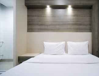 Bilik Tidur 2 Homey Studio Apartment at Tamansari Papilio By Travelio