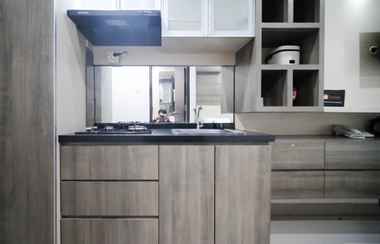 Khu vực công cộng 2 Homey Studio Apartment at Tamansari Papilio By Travelio